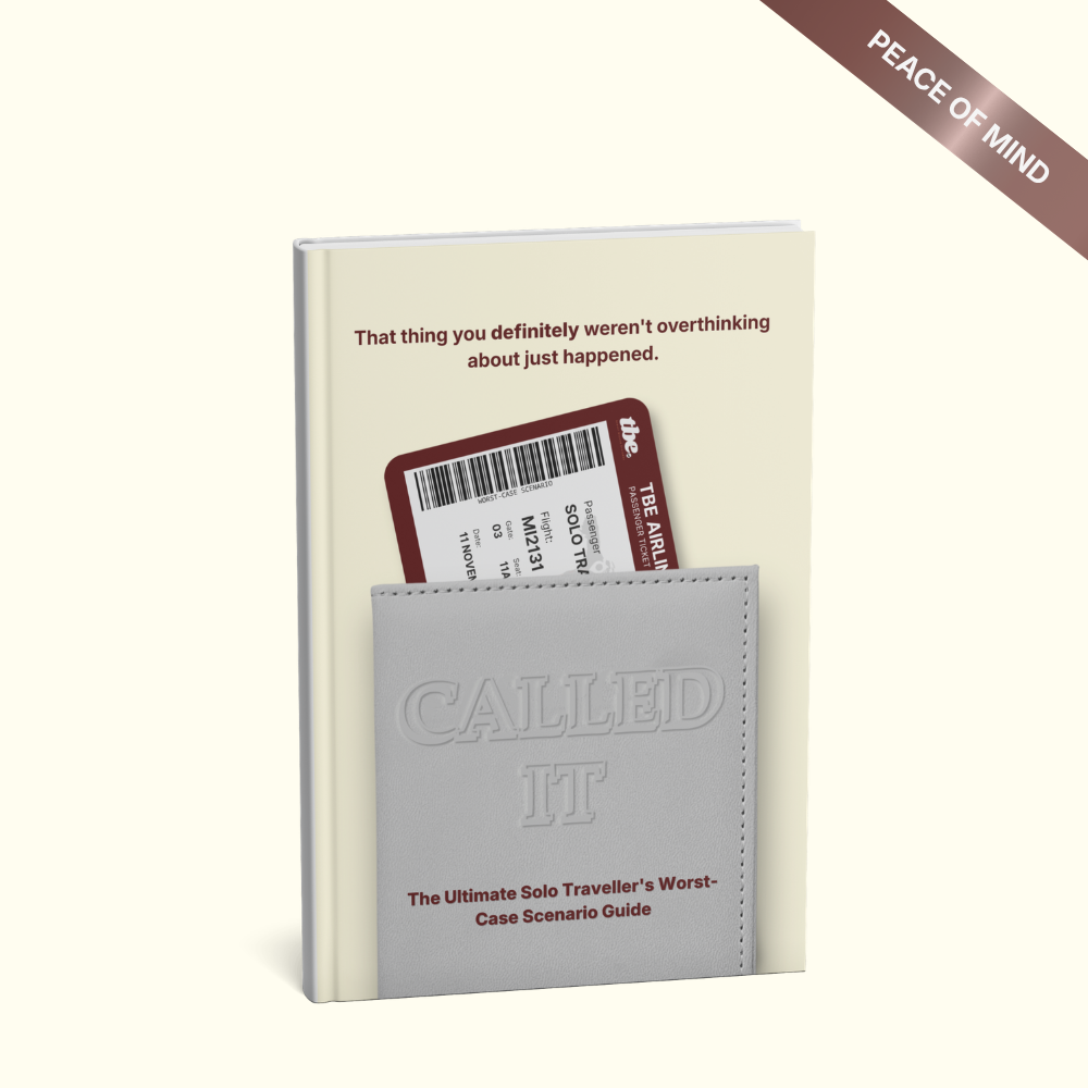 A book titled 'Called It: The Ultimate Solo Traveller's Worst Case Scenarios Guide' shown standing upright with a gray leather-like pocket holding a red boarding pass. The background is a warm off-white, and a brown diagonal banner in the top right reads 'PEACE OF MIND'.